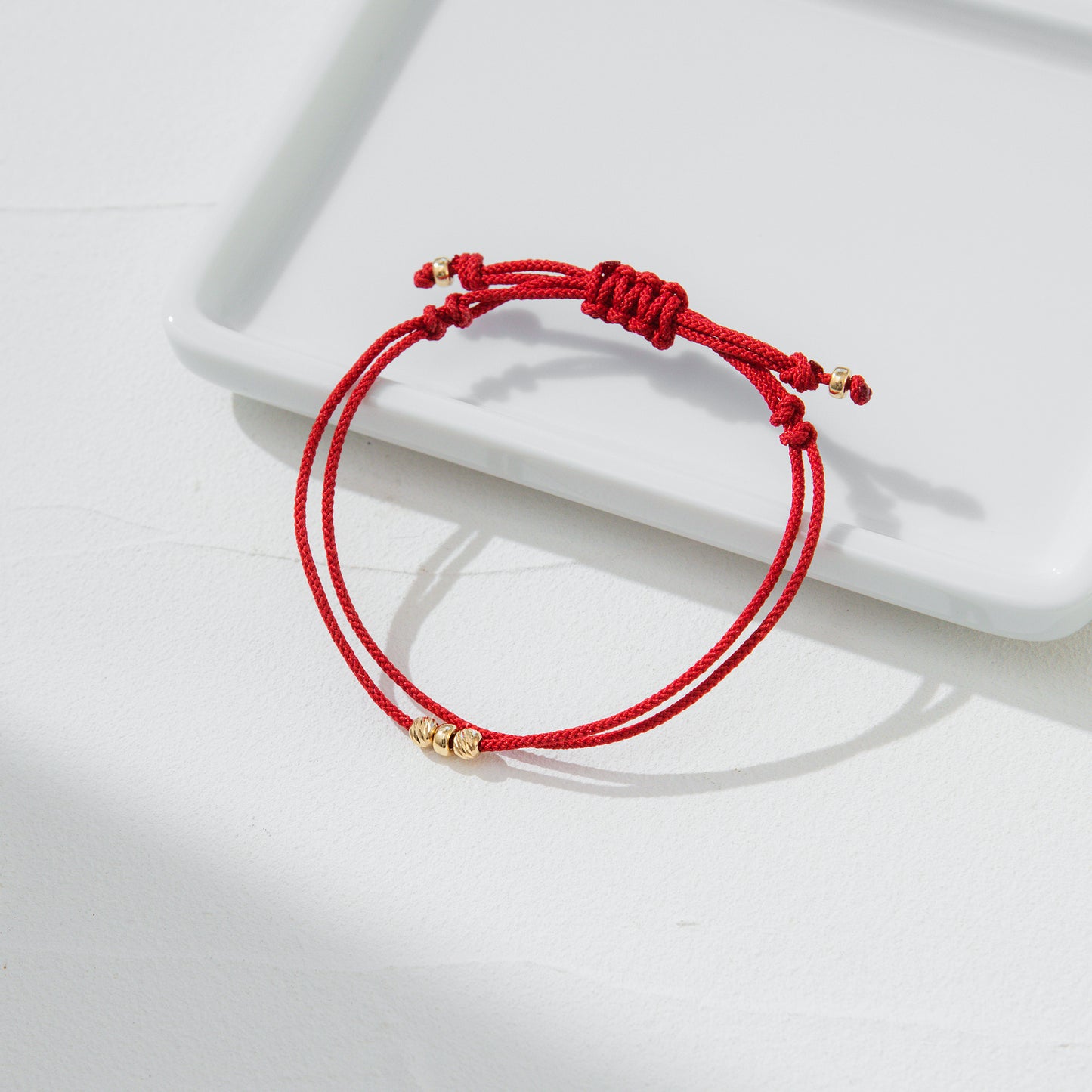 K18 gold bead cord bracelet