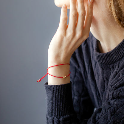 K18 gold bead cord bracelet