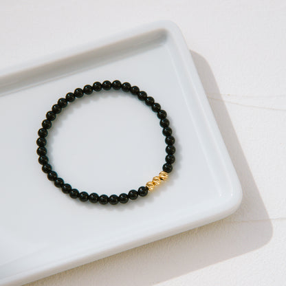 18K Gold Cut Bead and Onyx Bracelet