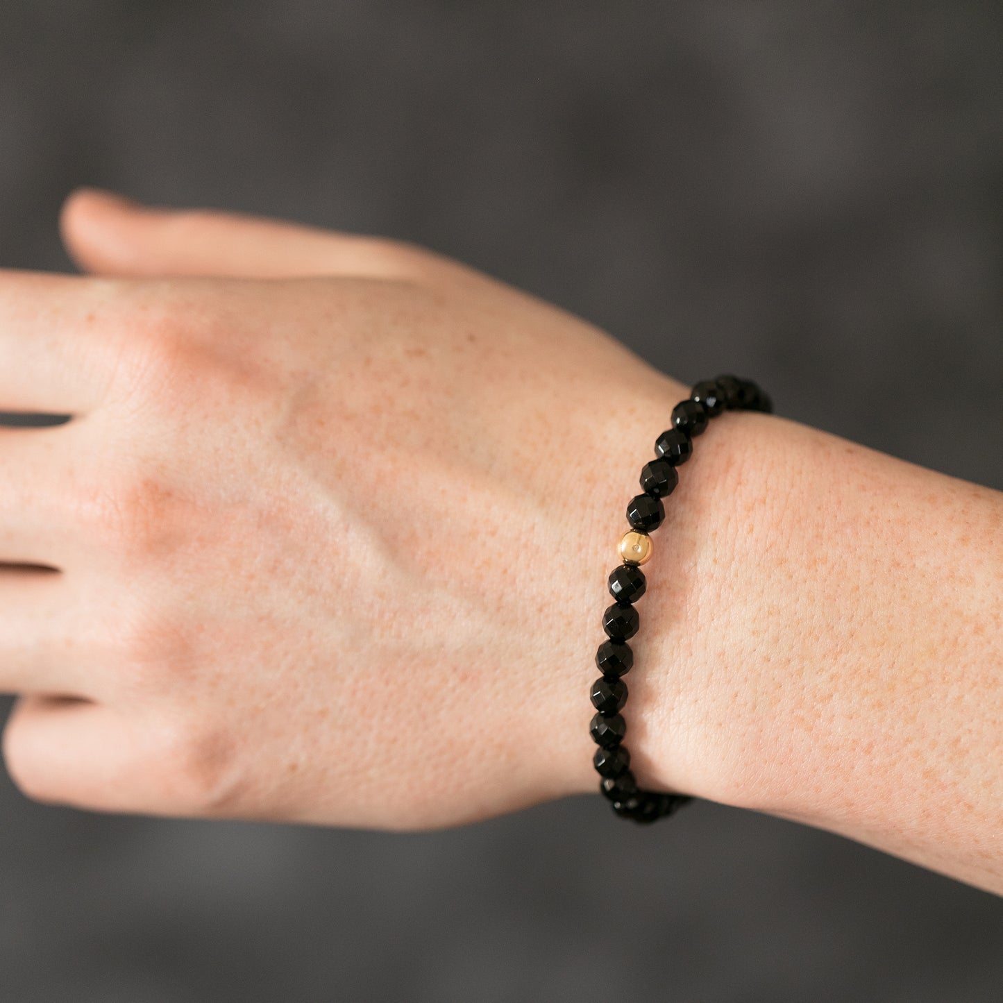 18K Gold Cut Bead and Onyx Bracelet